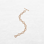 Bracelet in different circular shapes in rose gold made by O! Jewelry