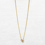 Fine necklace with with two diamond leaves in yellow gold made by O! Jewelry