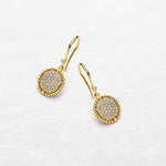 Earrings with circular plateau set in diamonds in yellow gold made by O! Jewelry