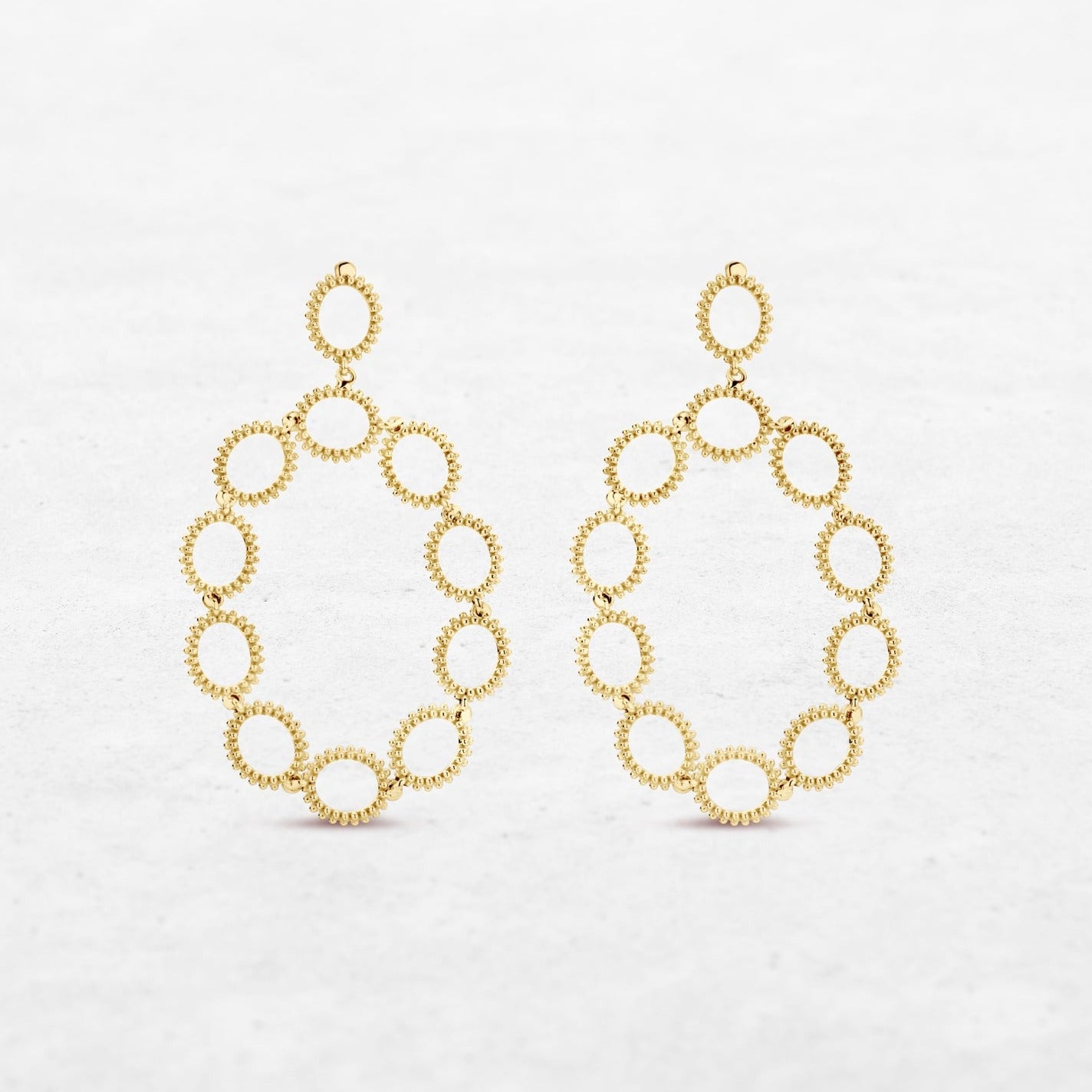 Circular earrings in yellow gold made by O! Jewelry
