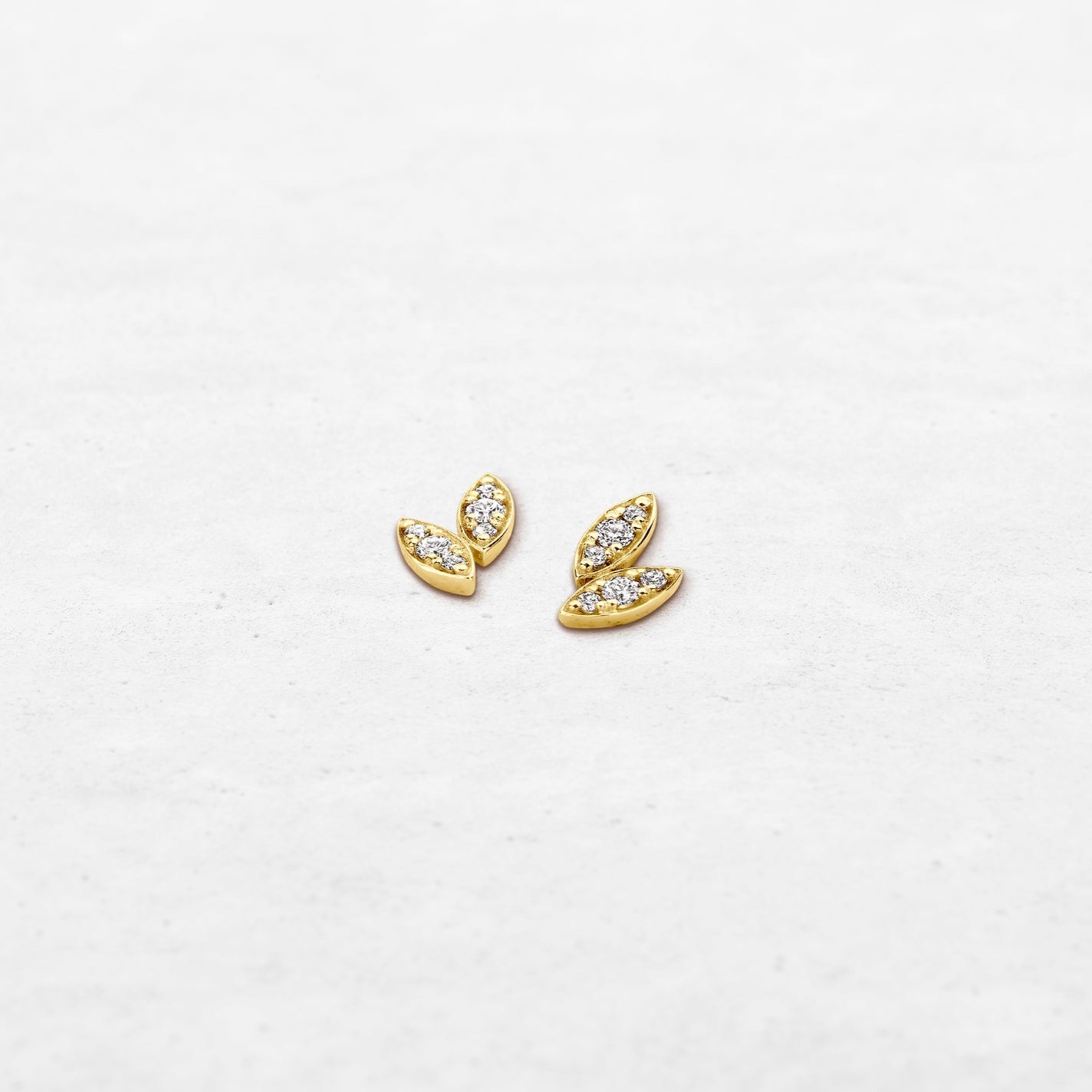 Double diamond leaf earring studs in yellow gold made by O! Jewelry