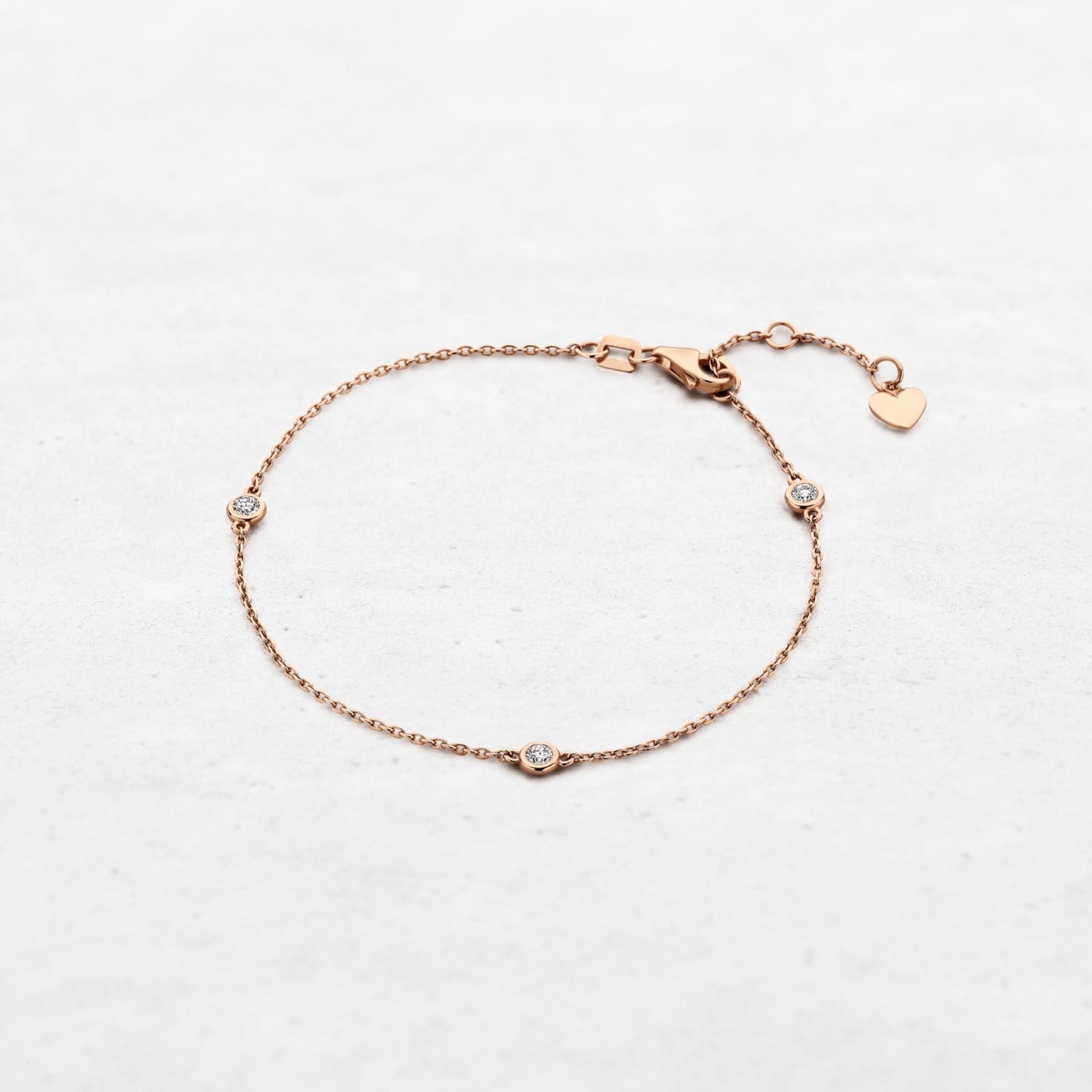 Bracelet with three diamonds in rose gold made by O! Jewelry