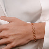 Bracelet around wrist of model made by O! Jewelry