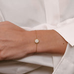 Bracelet with diamonds around wrist of model made by O! Jewelry